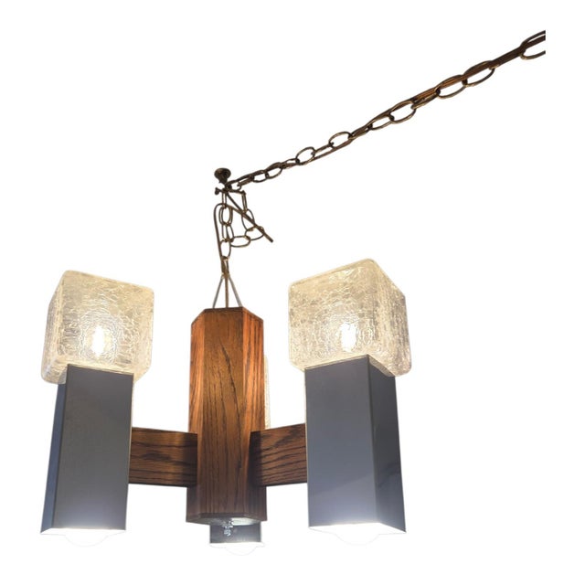 Stunning vintage 1970s mid-century brutalist pendant light fixture featuring a rare mixed-material aesthetic. Built with a...