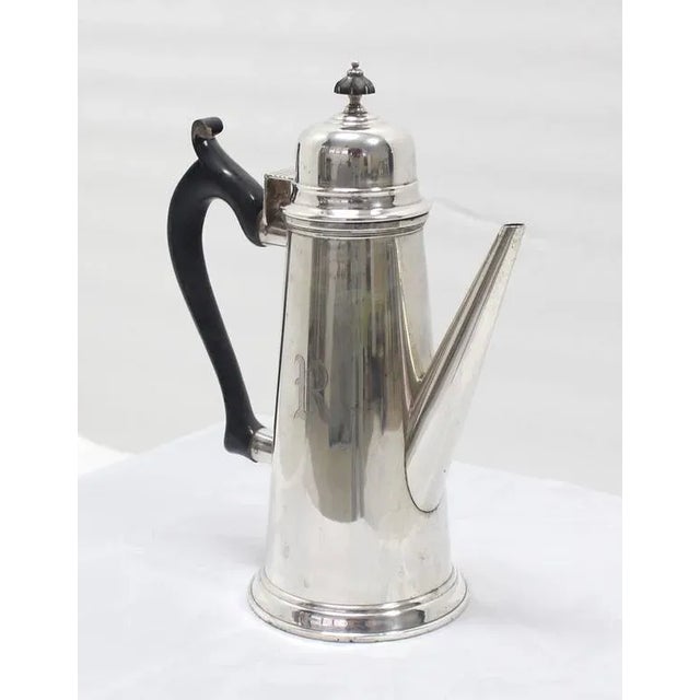 Very nice modern looking sterling silver tea or coffee pot.