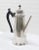 Very nice modern looking sterling silver tea or coffee pot.