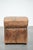 We offer this sturdy square vintage sheepskin pouf/footstool in beautiful colors. A sheepskin footstool, also known as a...