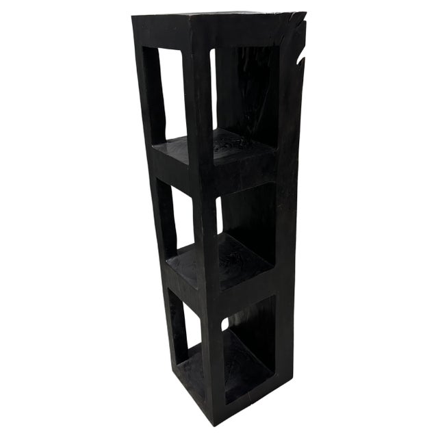 An impressive fallen teak log is hand carved into this beautiful display shelf whilst respecting the natural organic wood....