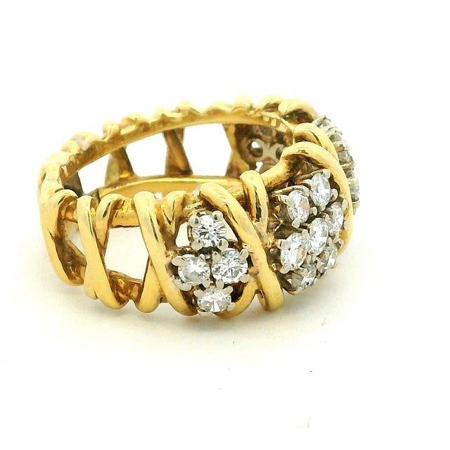 A beautifully crafted Italian diamond ring dating to the 1980s, fashioned in 18 karat yellow gold and set with twenty-two...