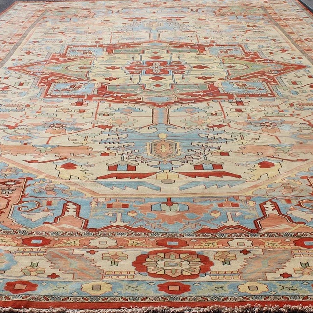 Shabby Chic Very Large Serapi Rug With Medallion on a Cream Background Keivan Woven Arts 16'9"x28'8" For Sale - Image 3 of 12