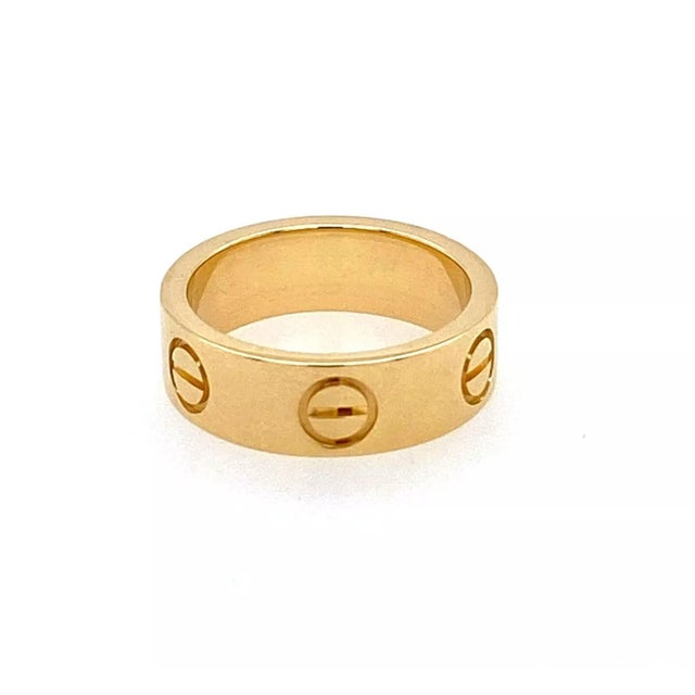 Contemporary Cartier Love 18k Yellow Gold Band Ring W/Cert - Size 4 For Sale - Image 3 of 4