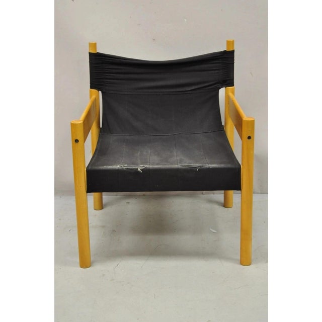 Vintage Mid Century Modern Scandinavian Black Canvas Birch Wood Lounge Chair. Circa Mid 20th Century. Measurements: 29" H...
