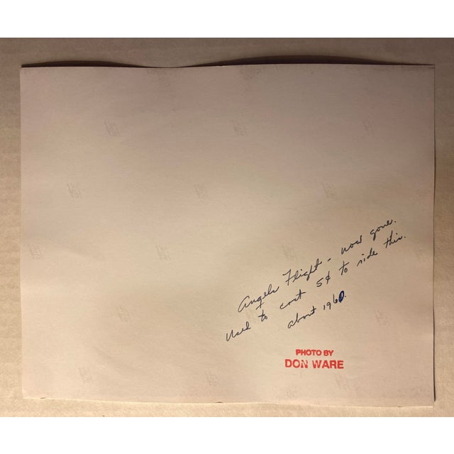 1960 black and white photo of the Angel's Flight funicular (in its original location) and the Third Street Tunnel in...