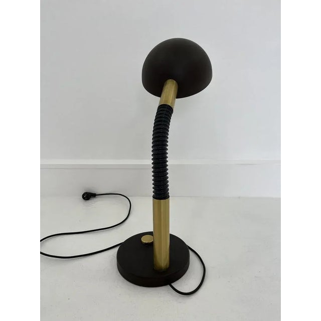 Beautiful Brutalist (looking) lamp. A few scratches on the lamp, but due to the industrial style of the lamp it is...