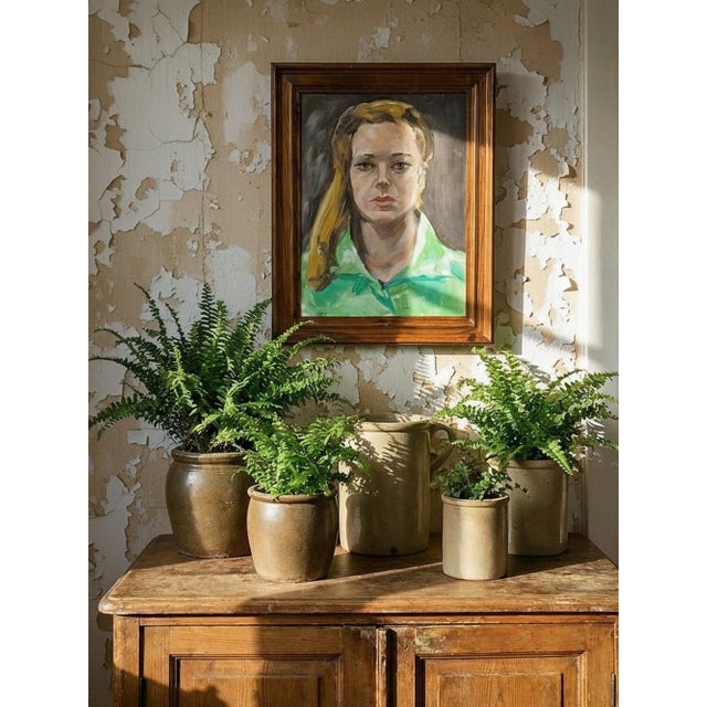 A beautiful modernist portrait, vintage, from the 1980s–2000s, depicting a woman dressed in bright green, with long,...