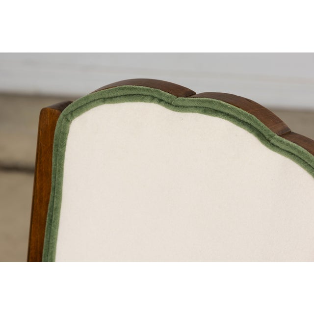 A refined set of six French Art Deco dining chairs, sourced in Provence and dating to the 1930s. The chairs present a...