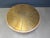 Round wooden coffee table with an etched brass top. Artistic table top with contrasting welding and etched brass pattern....
