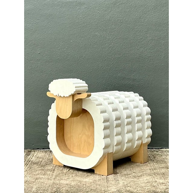 This vintage sculptural wood sheep stool brings whimsical folk-art character to a compact, functional form. Carved with a...