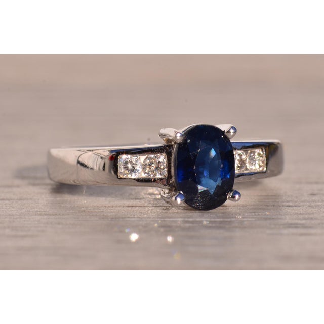 Silver Quatro Calle: Oval Brilliant Cut Midnight Blue Sapphire and Natural Diamond Ring For Sale - Image 8 of 11