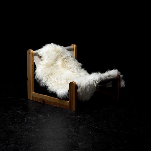 Sling chair in pine wood and canvas. Produced in Scandinavia, 1970s. Rare and desirable chair. 3 pieces available....