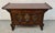 Distinctive antique-style Korean tansu cabinet featuring traditional butterfly hardware and richly detailed craftsmanship...