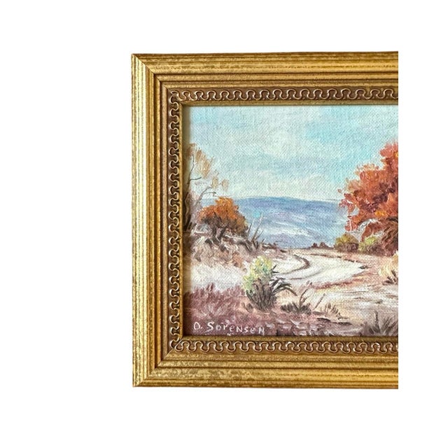 A lovely, original, petite landscape on board. Features an Autumnal landscape depicting trees laden with fall leaves. In...