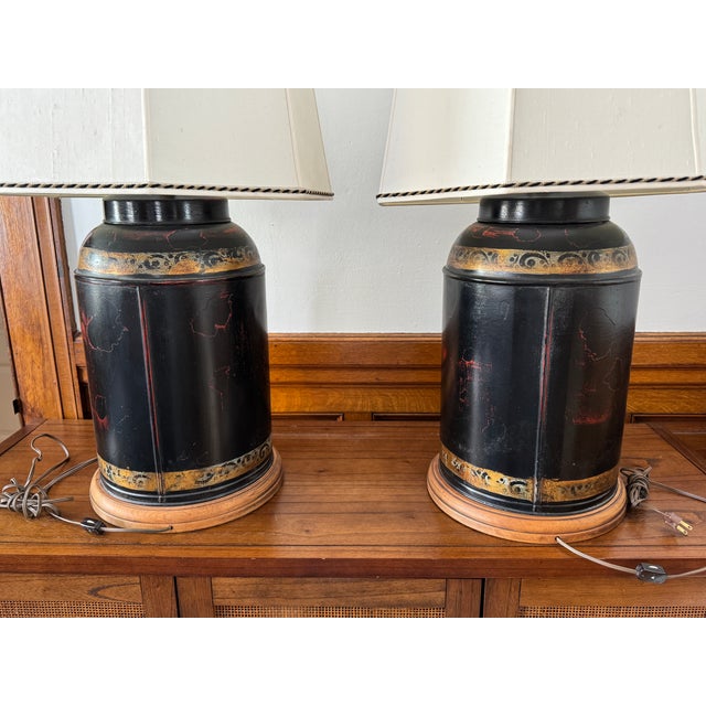 A gorgeous and statement-making pair of Mid-Century era tea canister style lamps. Possibly by Frederick Cooper. "74" and...