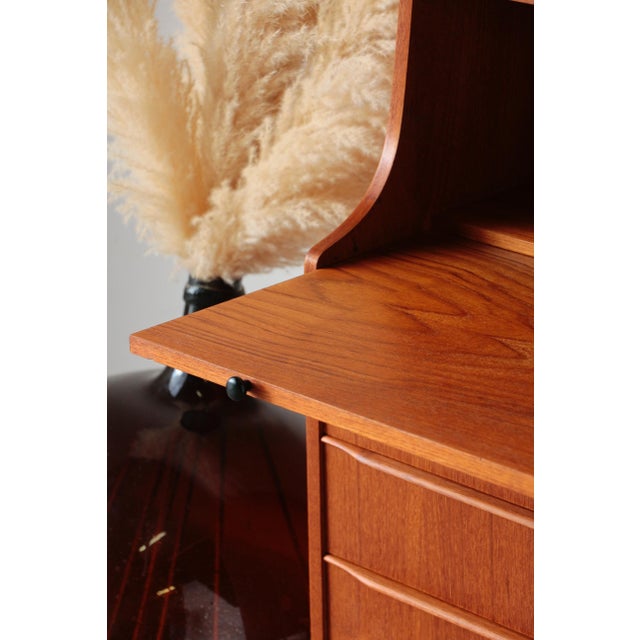 The elegance of 1960s swedish design give your interior a second life with this vintage teak secretary desk by royal...