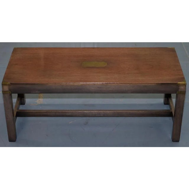 We are delighted to offer for sale this stunning Harrods London medium sized mahogany military campaign coffee table brass...