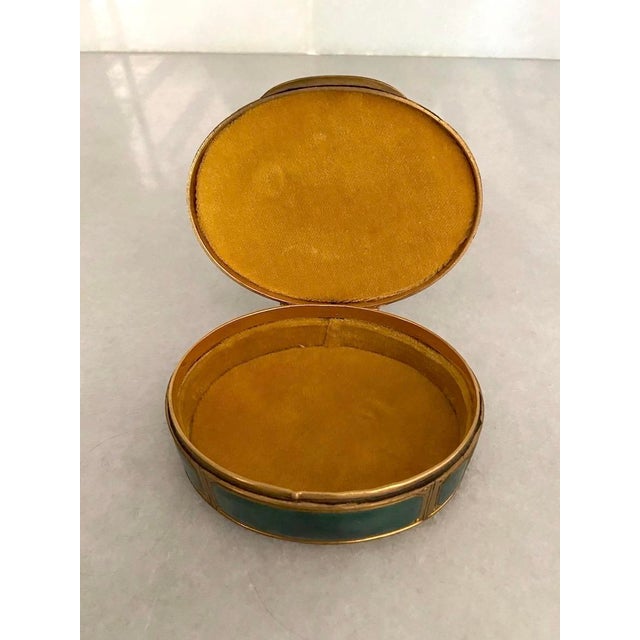 An elegant circa 1860 French jewelry box, beautifully crafted in cast bronze with vivid green guilloché enamel, gilt...