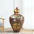 Dimensions: 22" W x 22" D x 40" H This is a vintage, hand embossed metal barrel from India. Used to store grains back in...
