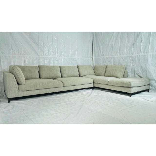 Elegant two-piece sectional sofa designed by Antonio Citterio for B&B Italia, Italy. This model showcases the clean-lined...