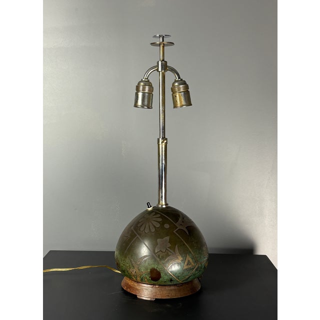 A rare and striking art deco table lamp from the celebrated ikora metalware line produced by württembergische...