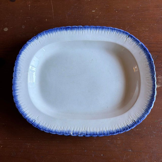 Antique Pearlware Blue Feather Edge Platter, English, Early 19th Century A classic early 19th-century English pearlware...