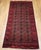 This exceptional early 20th century Turkmen tribal area rug is a rare and highly collectible example of nomadic Central...