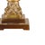 Traditional crystal column lamp featuring a cut glass pilaster with decorative antiqued brass capital and base. Top with a...