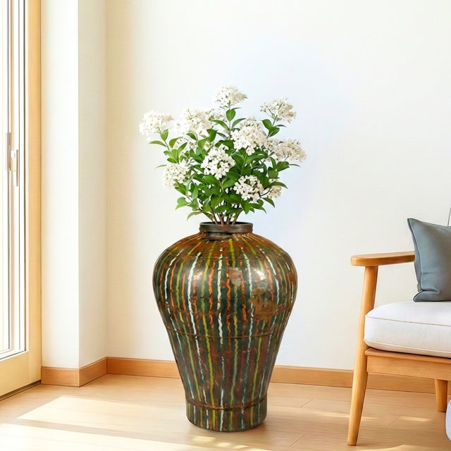 Dimensions: 16" W x 16" D x 24" H This is a vintage hand painted metal canister, which was used for storing grains....