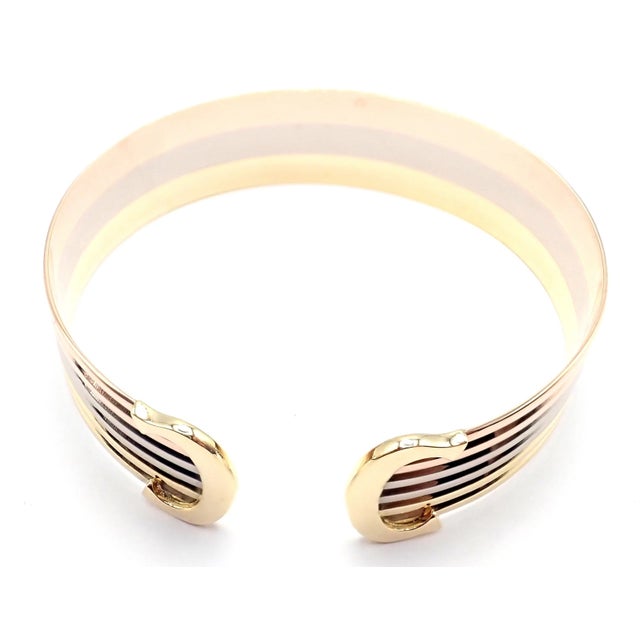 Metal Cartier Tri-Color Gold Double C Wide Cuff Bangle Bracelet For Sale - Image 7 of 9