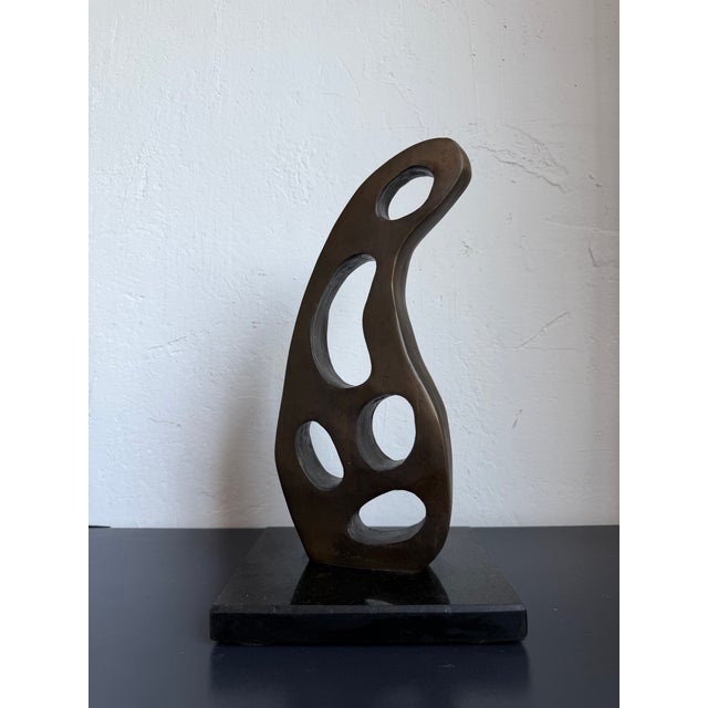 Brazilian contemporary modern bronze sculpture on black granite base by plastics artist C Del Guerra, Brazil 1980s.