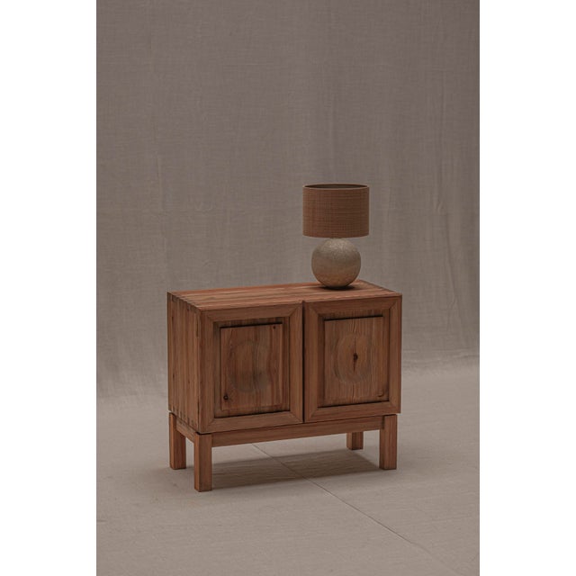 Characteristic Brutalist two door cabinet. Made out of solid and veneered wood. Dutch piece dating from circa 1960....