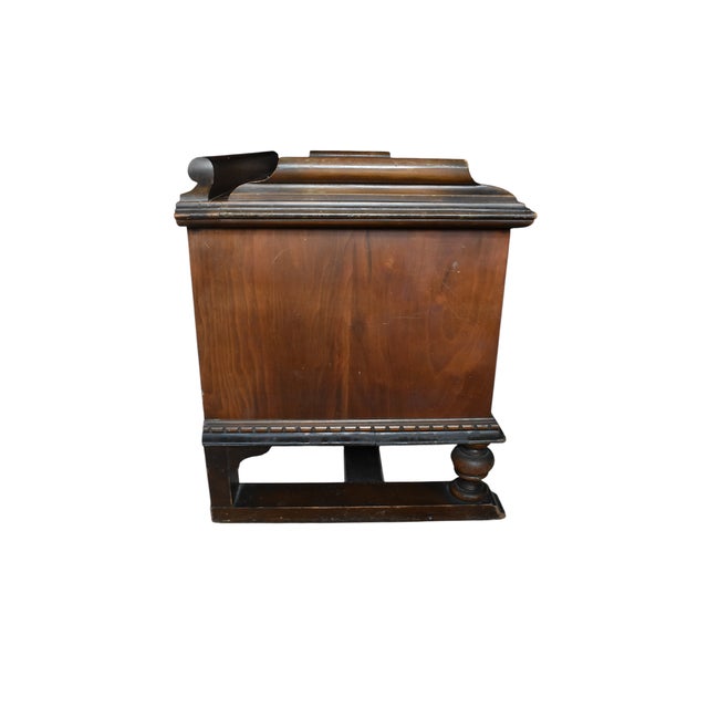 Gorgeous cedar lined chest by Cavalier featuring hand carved ornamental accents, a lovely walnut veneer, and turned...