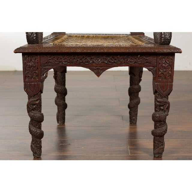 Brown Anglo-Indian 1900 Armchair with Carved Back, Mythical Creatures and Woven Rattan For Sale - Image 8 of 12