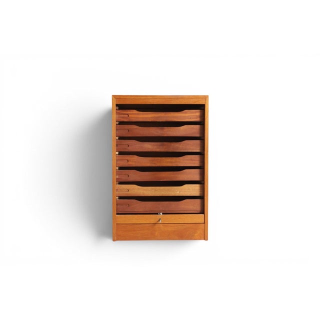A compact and impeccably made 1960s Danish modern file cabinet in solid teak — practical Danish cabinetwork at its most...