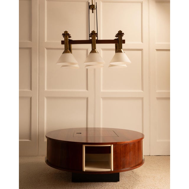 MANIFATTURA ITALIANA, Circa 1960 Six-light pendant lamp. Painted metal, wood, brass and opaline glass. Dimensions :...