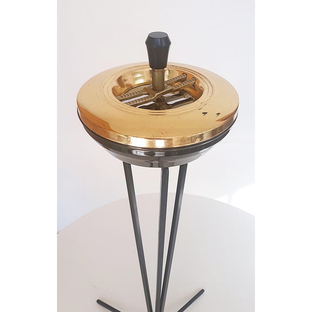 Item: Freestanding Ashtray Item: Ashtray Age: Approx. 1950s Color/Material: Black, Metal Dimensions: Height 57cm Diameter...