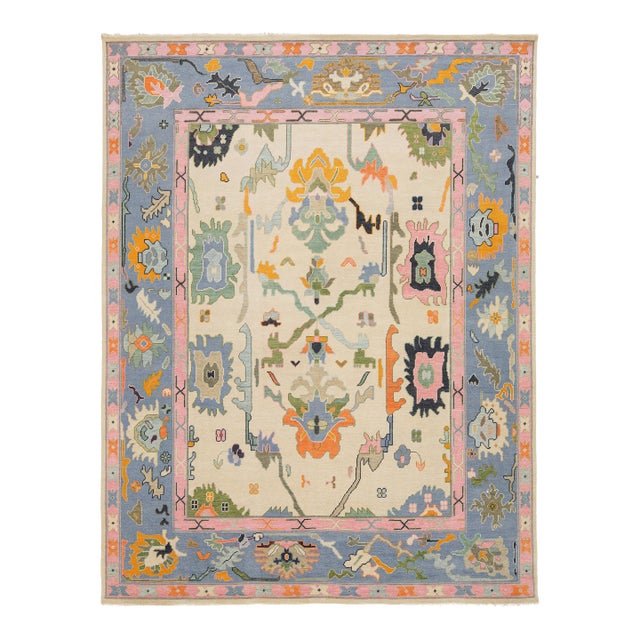Contemporary Hand-Knotted Oushak Style Wool Rug in Ivory, Soft Blue, & Pastel For Sale