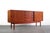 Gorgeous teak grain w/ two slider drawers to the right and left. 4 drawers providing ample storage. Iconic Domino Mobler...