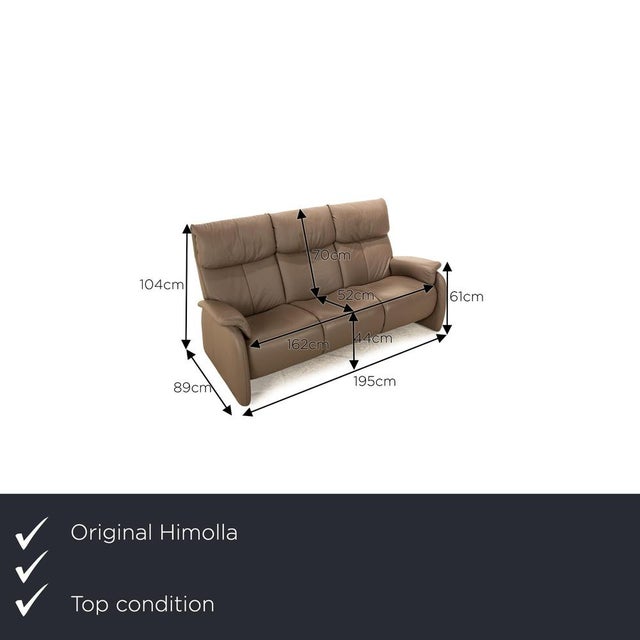 The 4879 sofa from Himolla is covered in brown genuine leather and stands on floor-to-ceiling side panels. The classic...