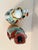 Featured in this listing is a pair of antique Famille Rose immortal statues from the Qing Dynasty in China. The statues...