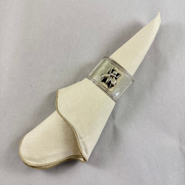An unusual oval sterling silver napkin ring with an applied Bumblebee, a symbol used by Napoleon of France, circa...