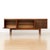 This vintage credenza was made in Glasgow, Scotland during the 1950s and designed by Neil Morris for Morris of Glasgow....