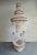 Huge floor to ceiling vintage Palm Beach/Boho cowrie shell hanging planter. String a light through the top to add drama to...