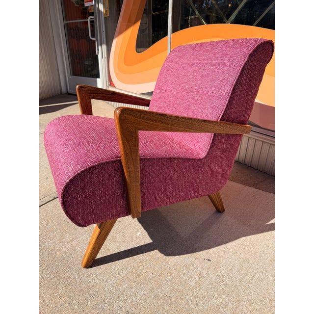 * professionally reupholstered in Knoll Textiles "Diva" in Snapdragon, high-end fabric, with all new high-density foam...