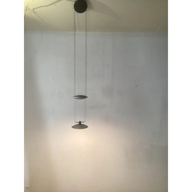 Sign in the trafo sticker Adjustable from 125 to 200cm Very heavy. g6.35 led light bulb This piece has an attribution...