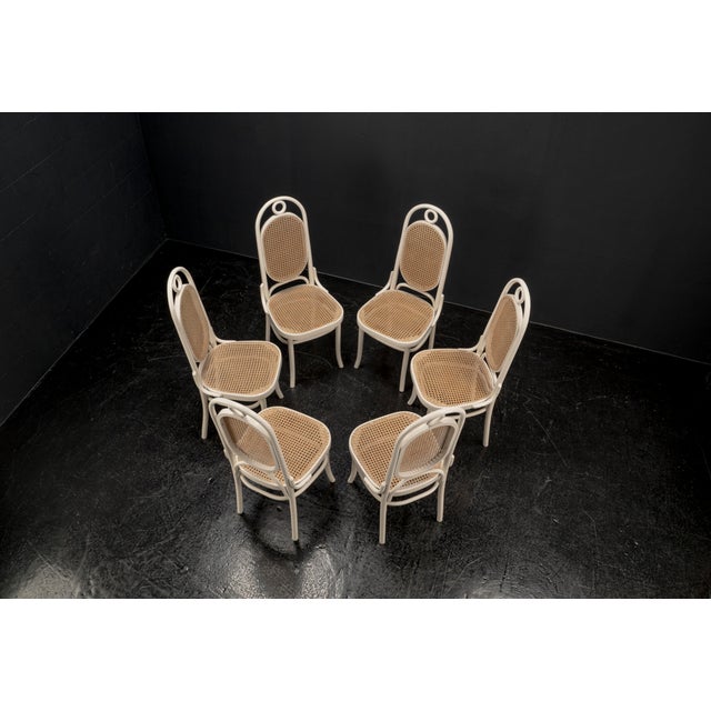 This set of six dining chairs, Model No. 207 R widely known by the nicknames "Lange Jan" or "Long John" s a true icon of...