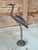 A charming vintage handcrafted heron sculpture featuring an elongated neck, slender legs, and beautifully sculpted form....