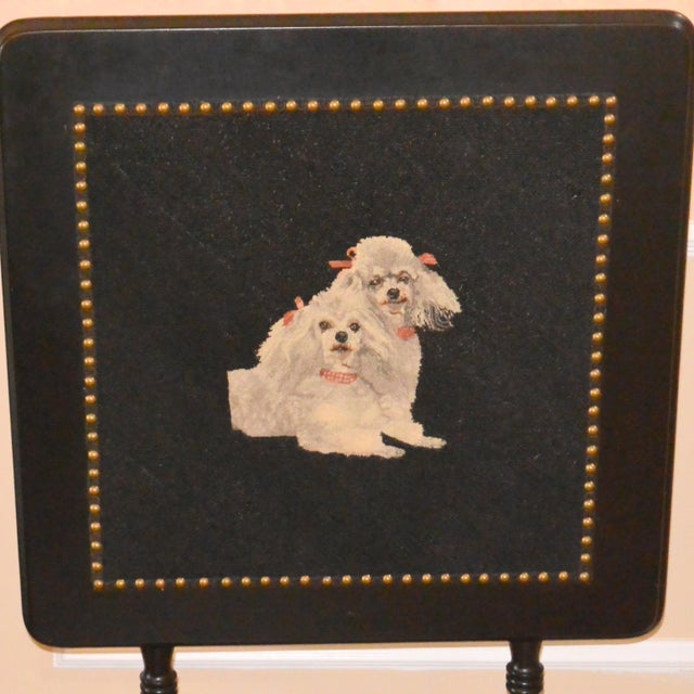 A quintessential piece of "Poodle Mania" decor, this vintage dual-purpose fire screen and tilt-top table captures the...